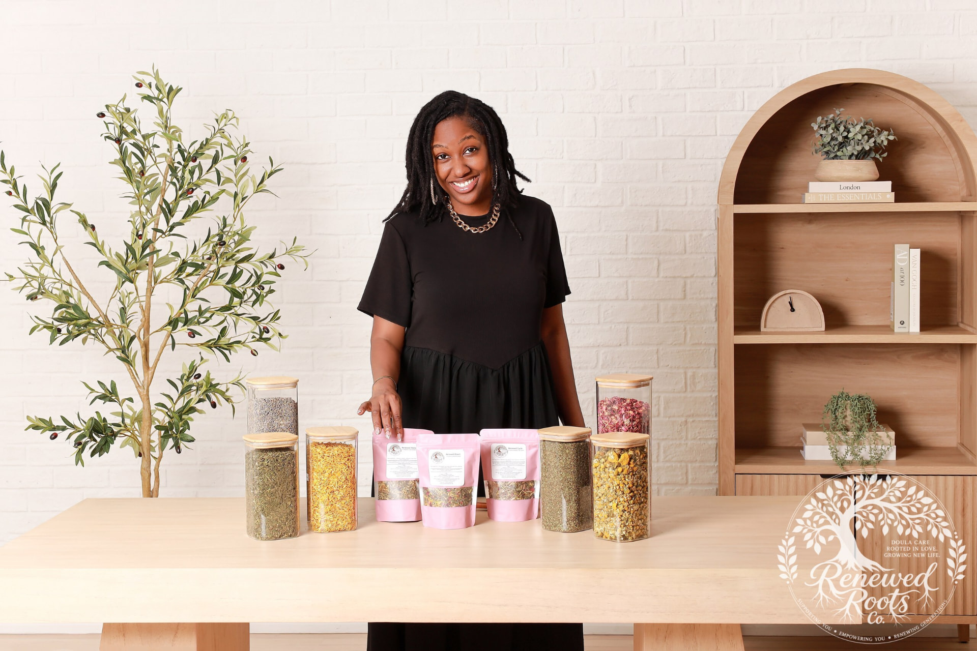 Eliana presenting Renewed Roots botanical wellness blends